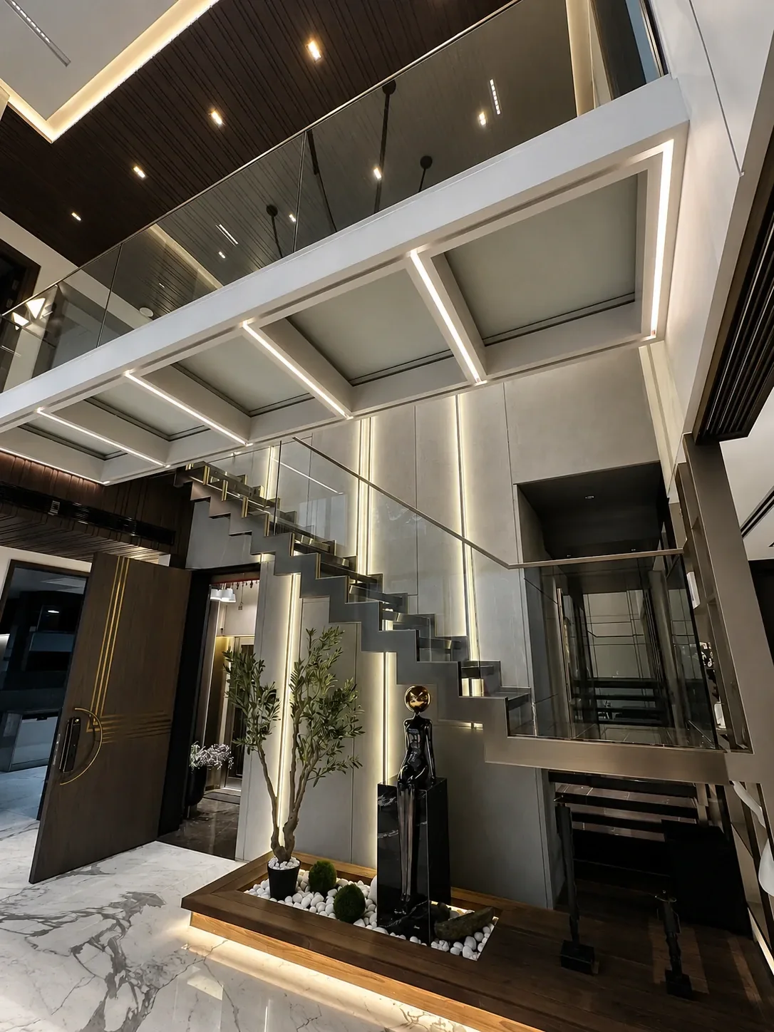 Double-Height Staircase & Glass Railings by Nexia Systems
