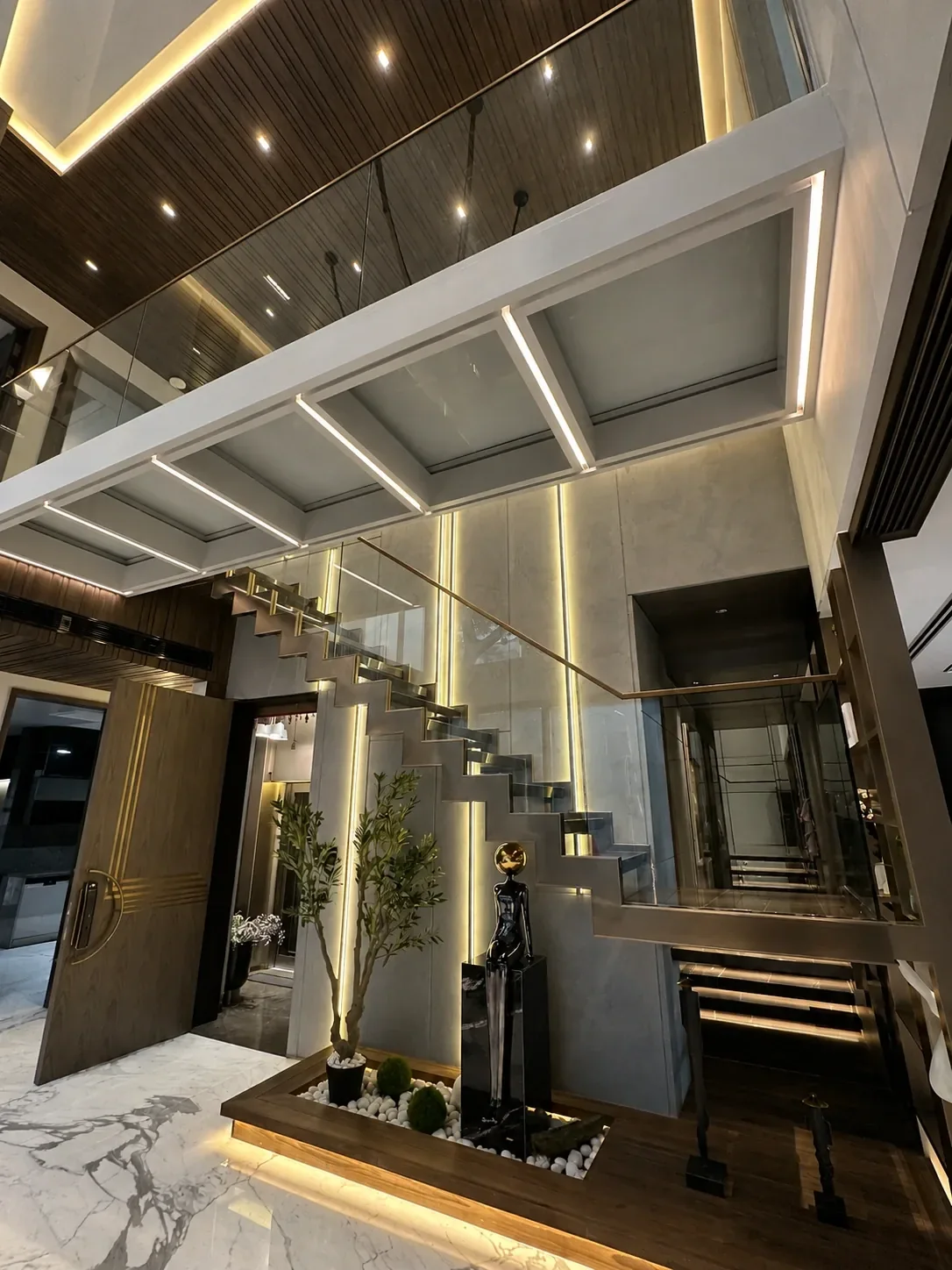 Double-Height Staircase & Glass Railings reference 4