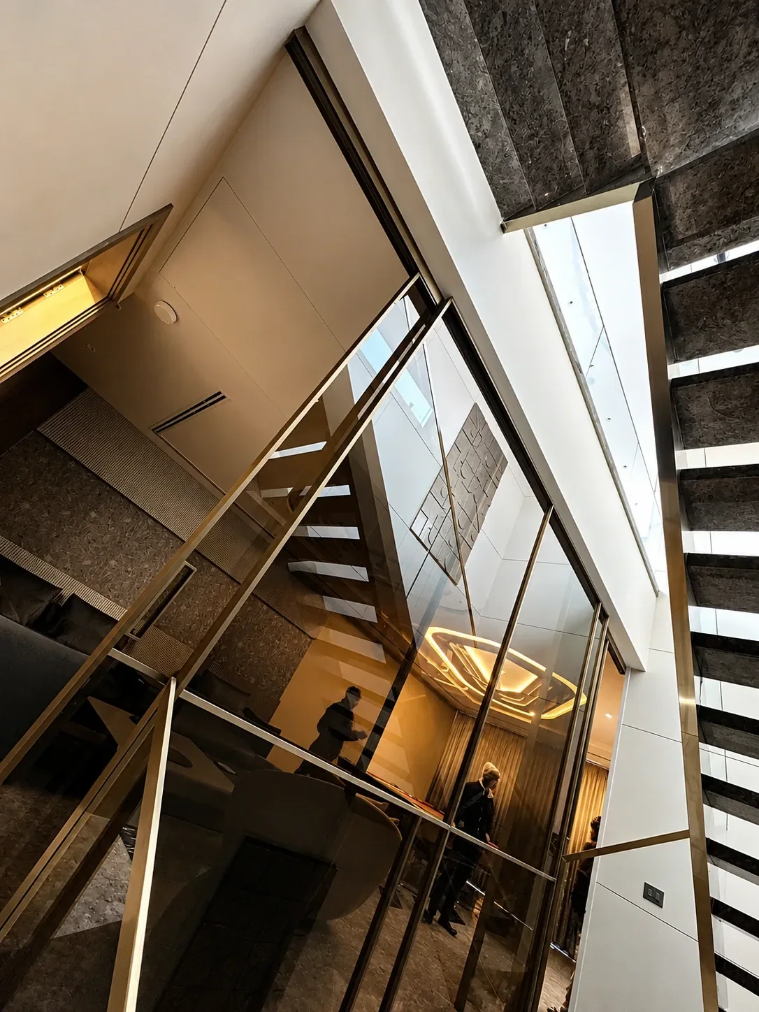 Double-Height Staircase & Glass Railings reference 6
