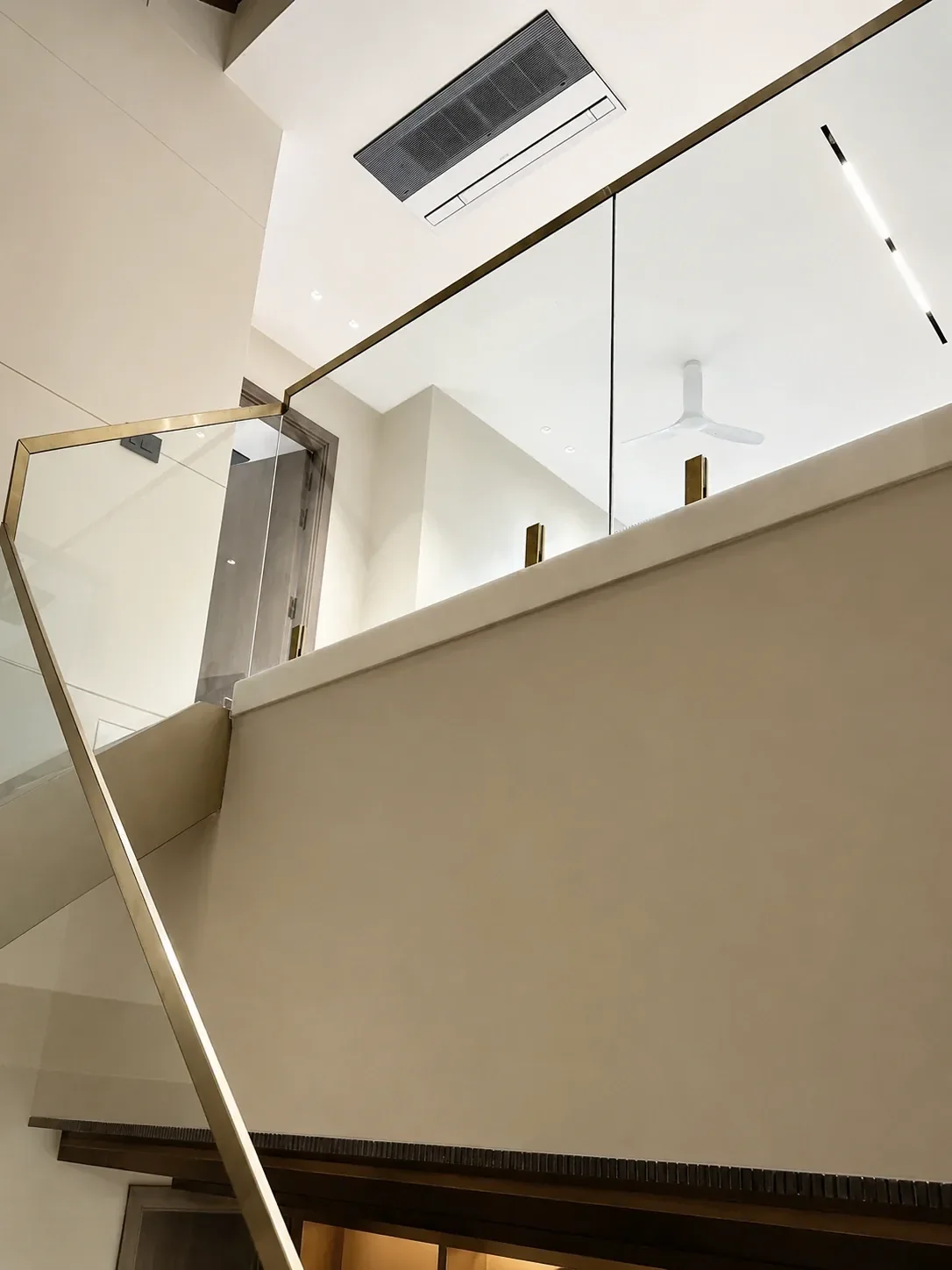 Double-Height Staircase & Glass Railings reference 7
