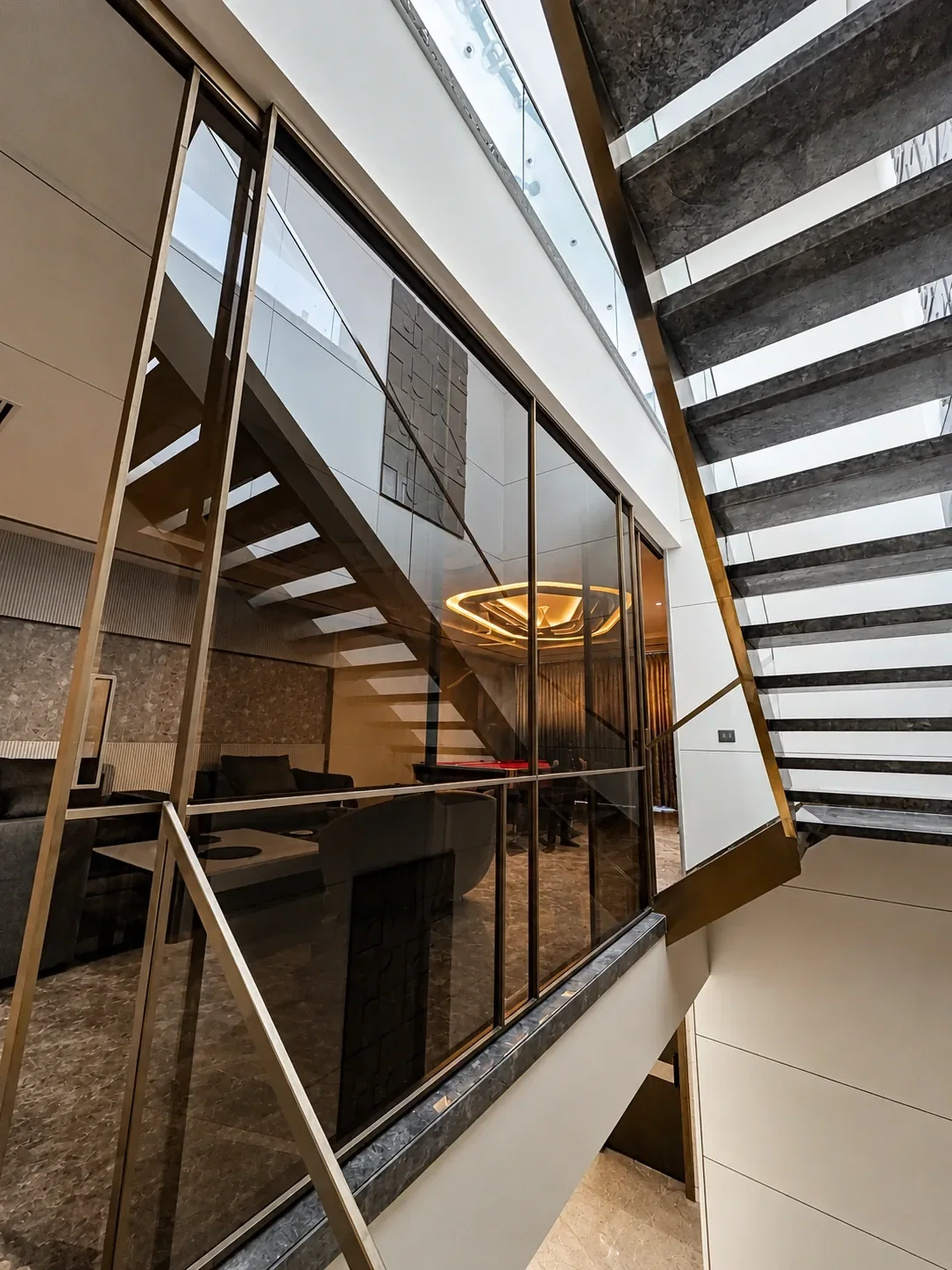 Double-Height Staircase & Glass Railings reference 12
