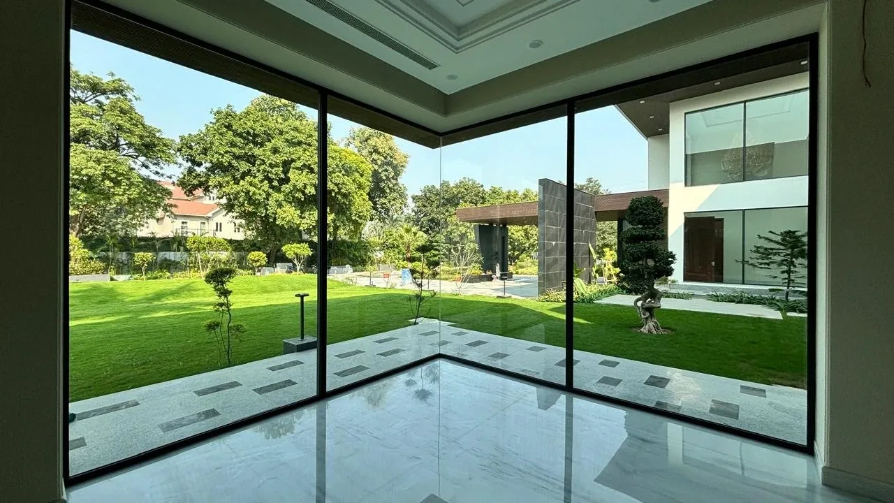Large sliding glass opening facing a lawn