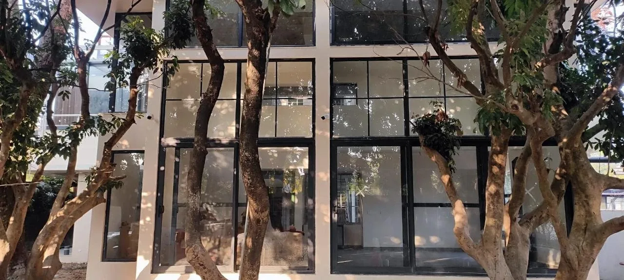 SK Das Dehradun facade black frame system